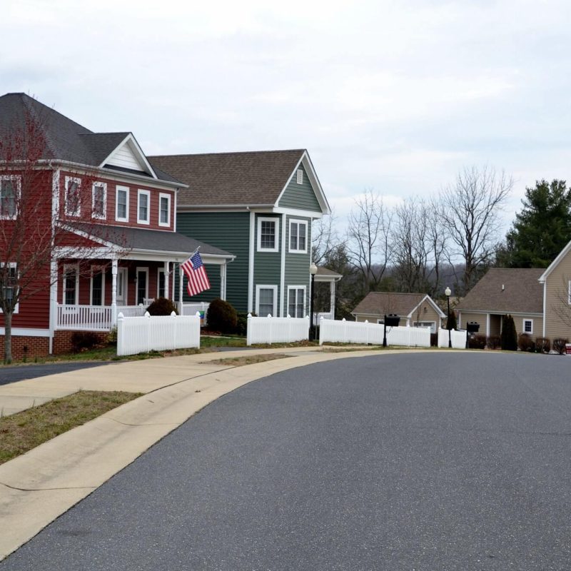 a-street-of-modern-homes-houses-in-various-colors-to-make-a-cozy-neighborhood-of-prime-real-estate-1.jpg